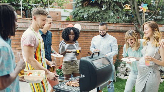 Friends grilling at a cookout