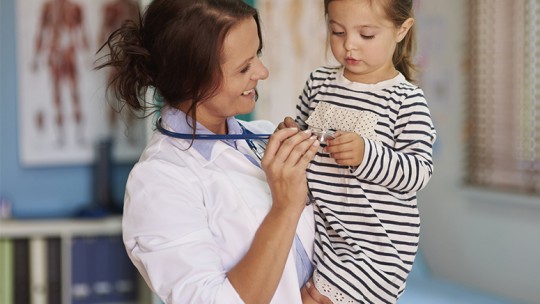 Doctor reassures a child