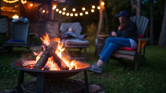 Family around bonfire
