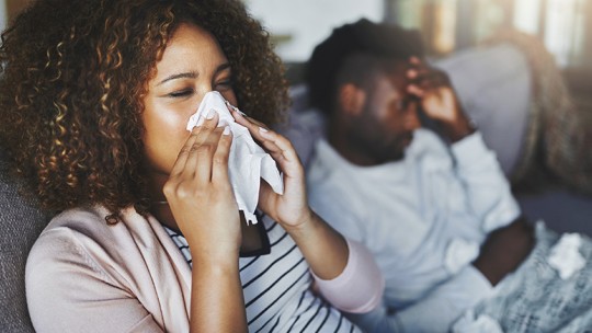 Woman and man sick with flu