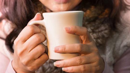 Woman holding a mug