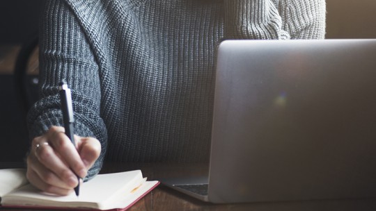 Woman working at a computer
