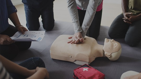 people learning how to give hands-only CPR