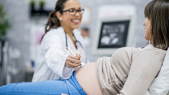 pregnant woman with caregiver