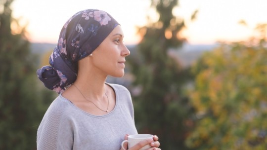 cancer patient drinking coffee outside