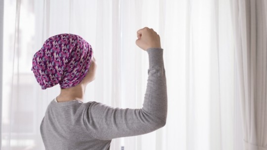 cancer survivor facing window 