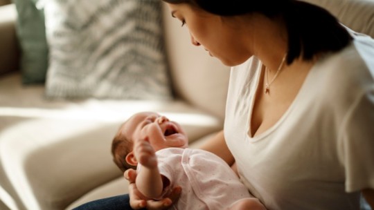 mom with crying newborn