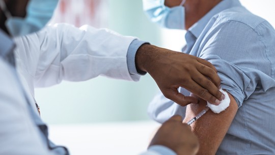 Man receiving vaccine