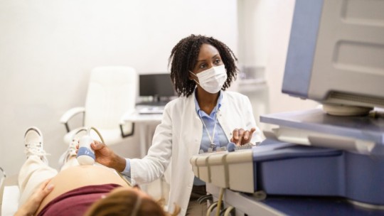 pregnant woman getting ultrasound 