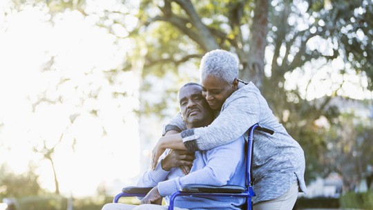 couple outside hugging 