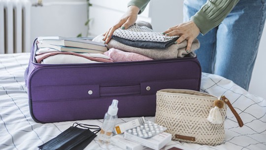 Woman packing for international travel