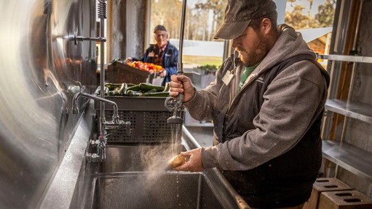 Mikkal, farmer at Community Farm in Anderson