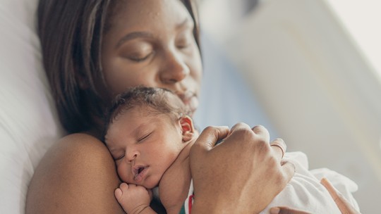 Mom holding newborn baby