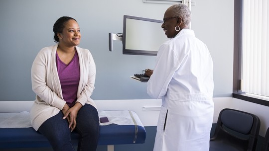 patient at annual physical appointment with primary care provider