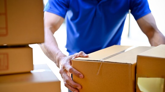 Man delivering heavy packages