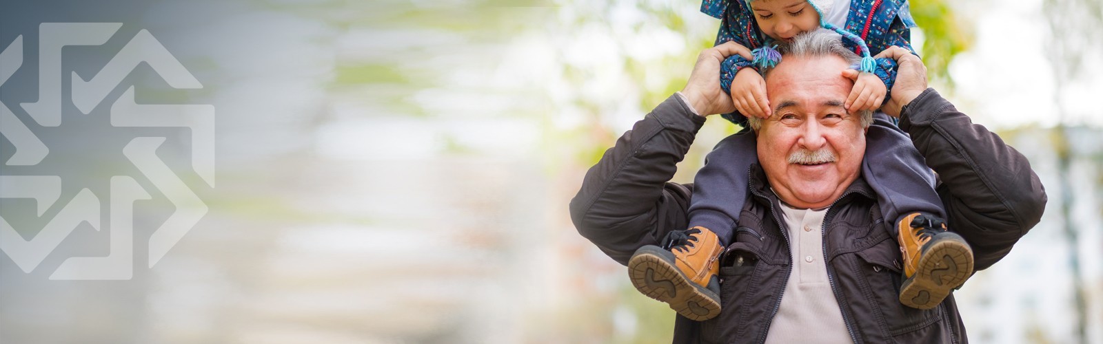 Grandad with grandson on his shoulders