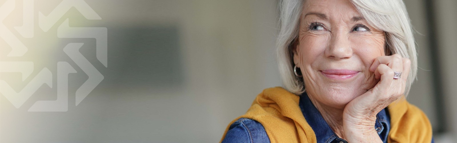 Older woman with hand on chin