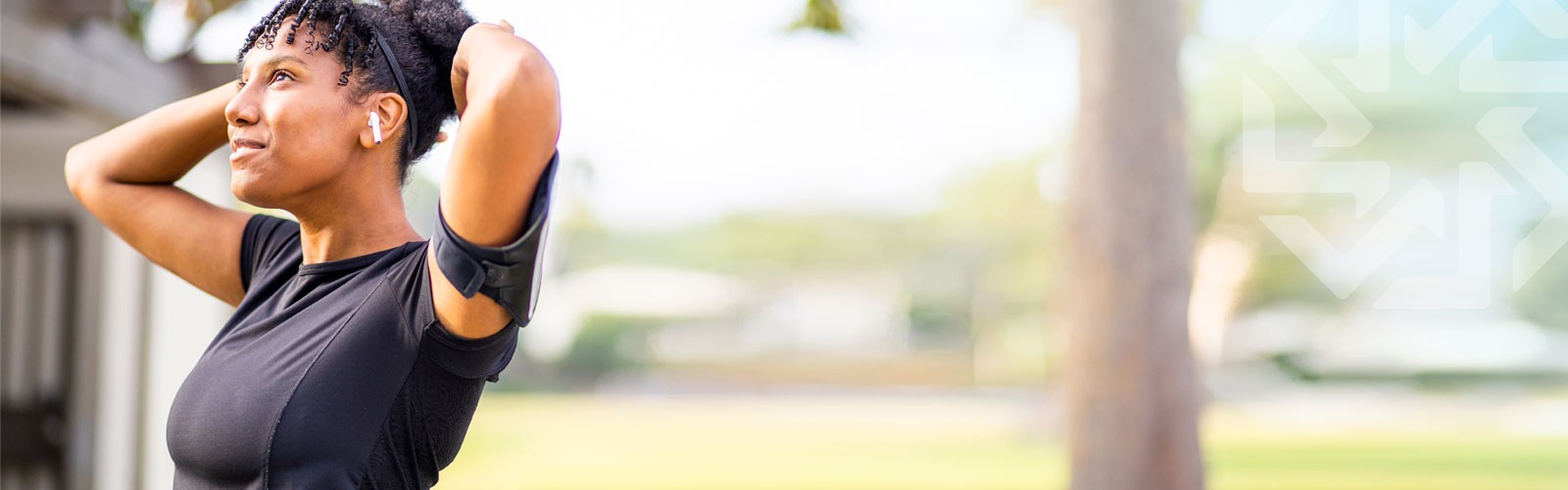 Woman runner stretching arms