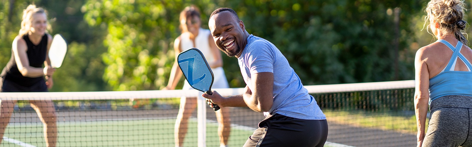 Group playing pickleball