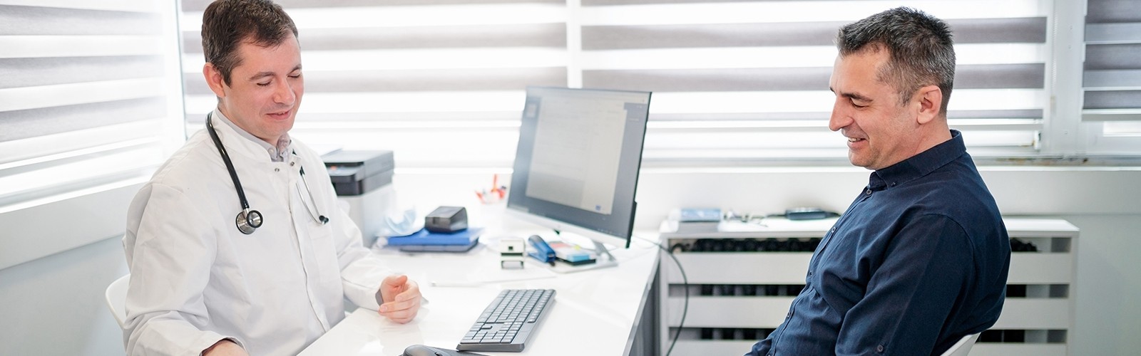 Executive having a consult with a doctor