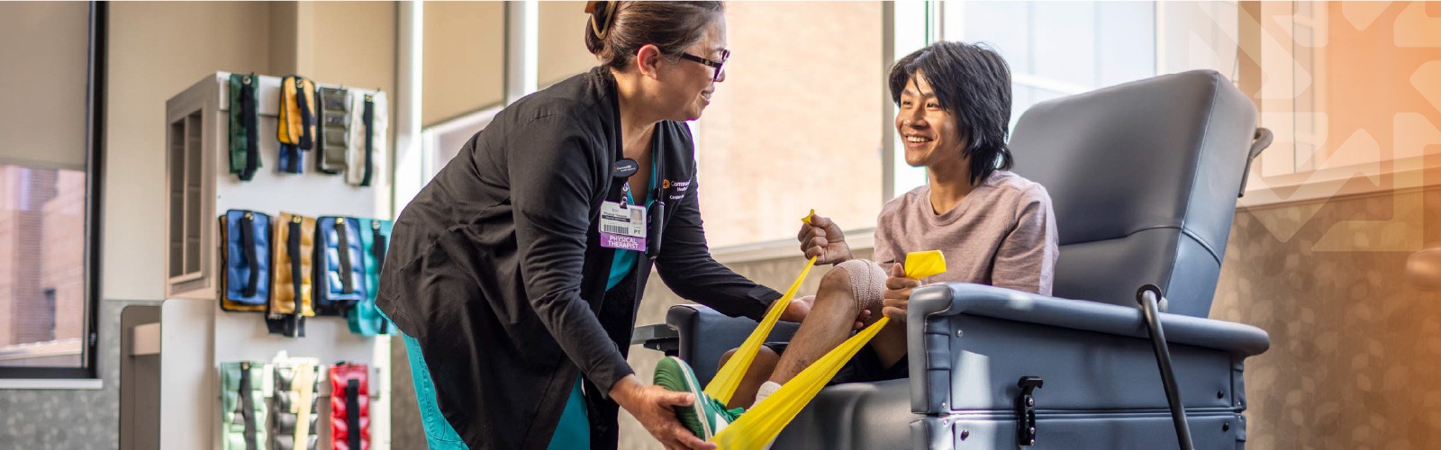 Physical therapist working with patient