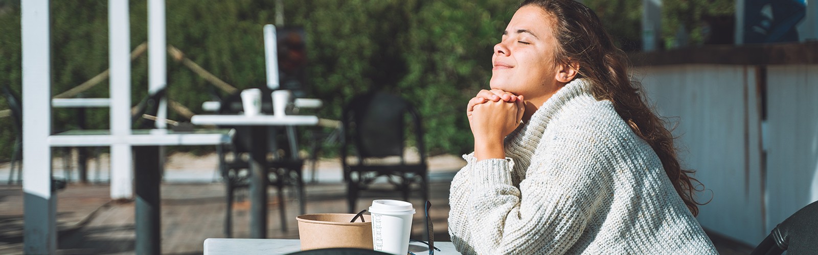 Woman getting sun on her face