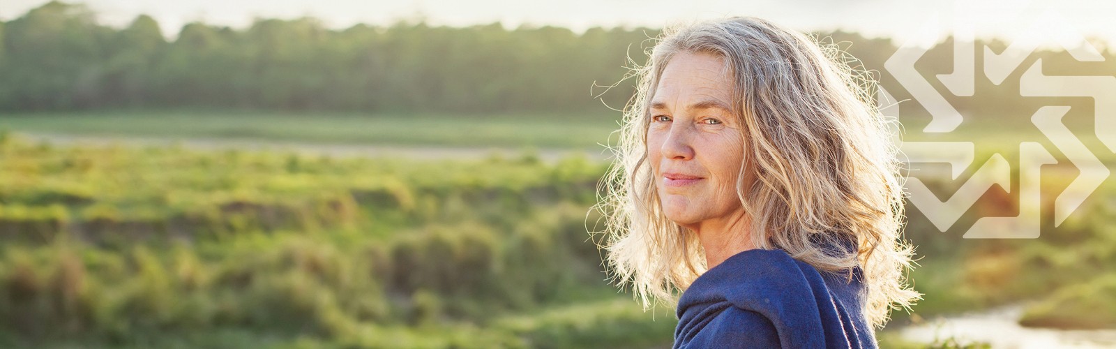 Healthy mature woman at sunset