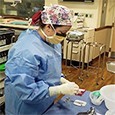 Surgical tech prepping in operating room