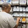 Patient care tech in supply room