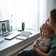Mom and son having a video visit with family doctor