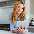 Woman on tablet at home