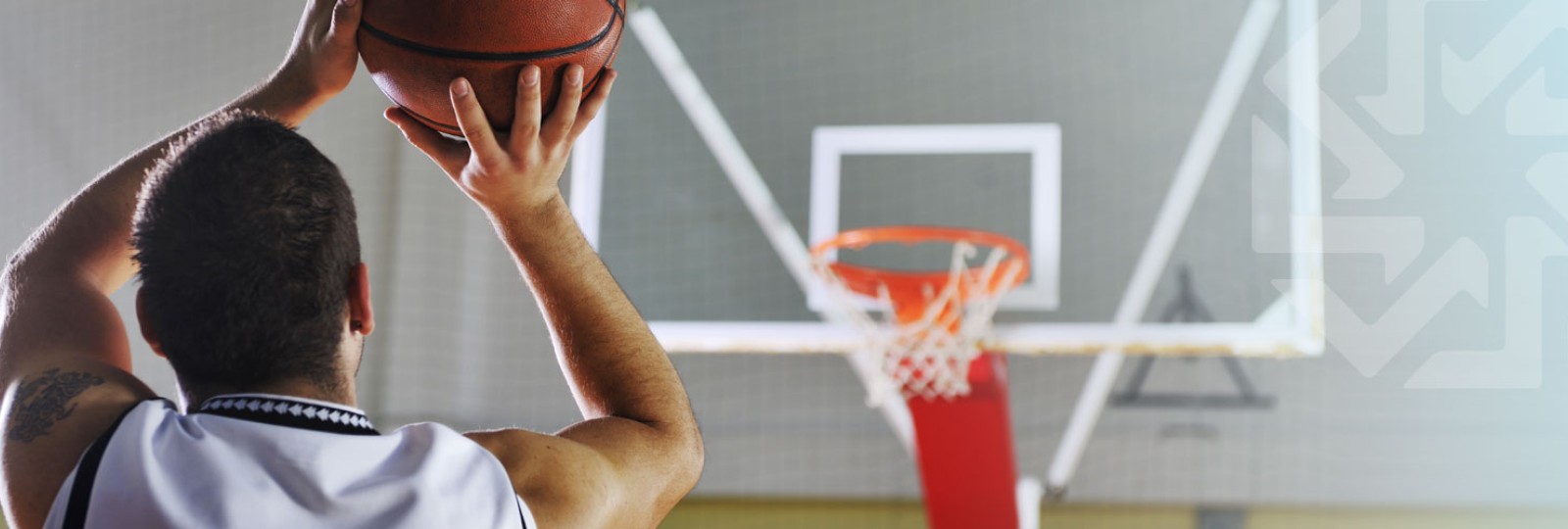 Man shooting a basketball