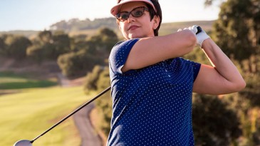 Woman doing a golf swing