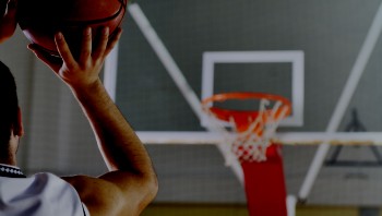 Man shooting a basketball