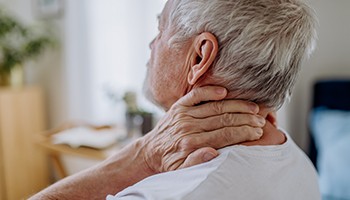 Older man with neck pain