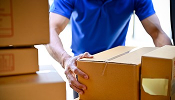 Man delivering heavy packages